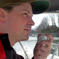 Chirs Edmonston operating a boat