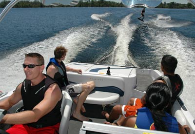 wake boarding behind a boat