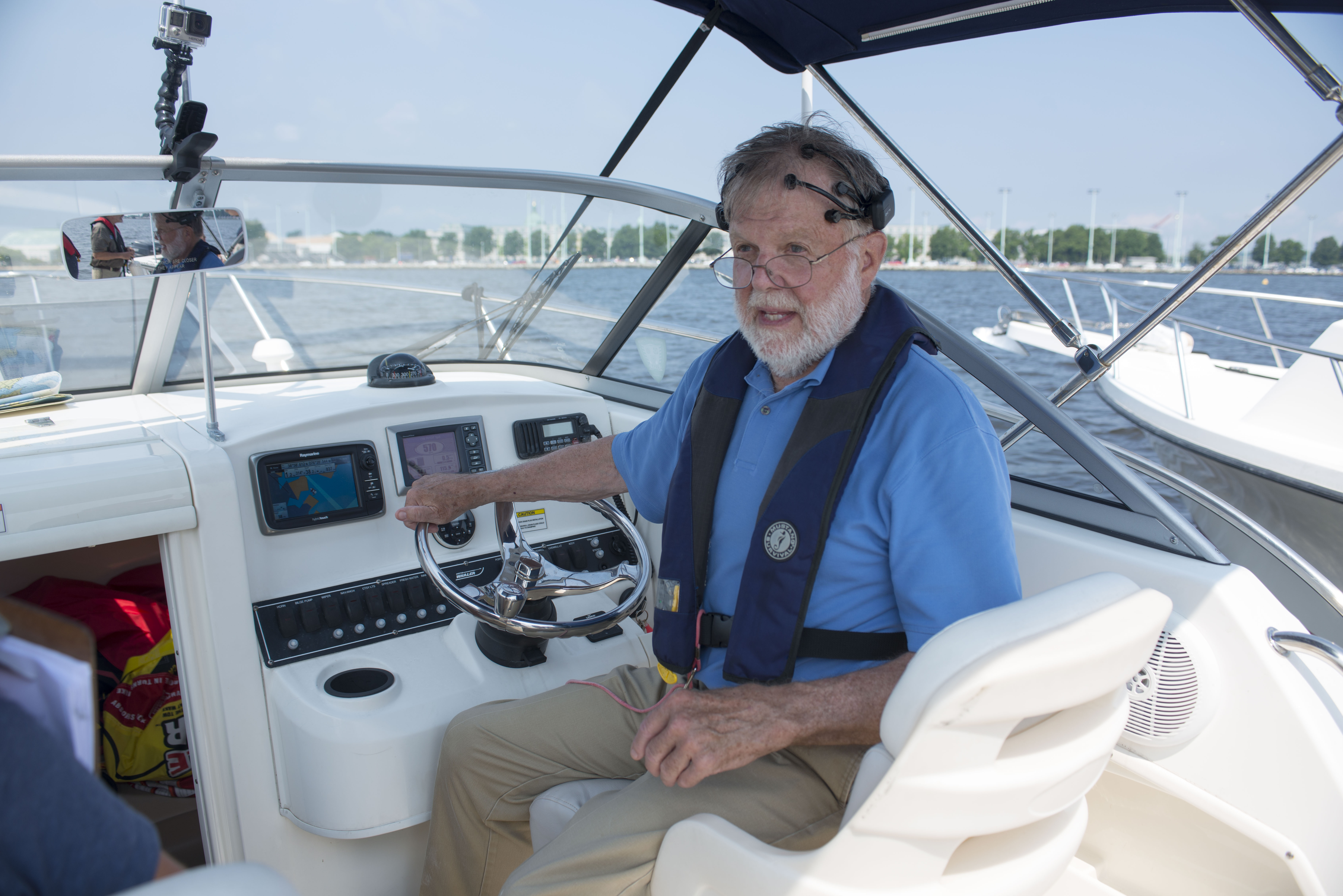 John Page Williams at the helm
