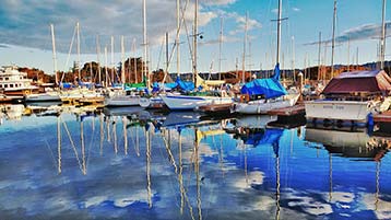 a birds eye view of boats at a marina