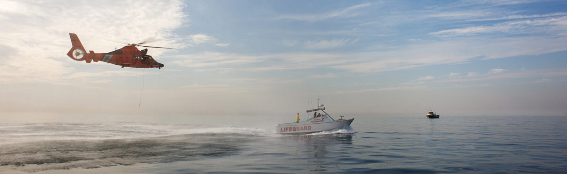 the US Coast Guard practices with a helicopter