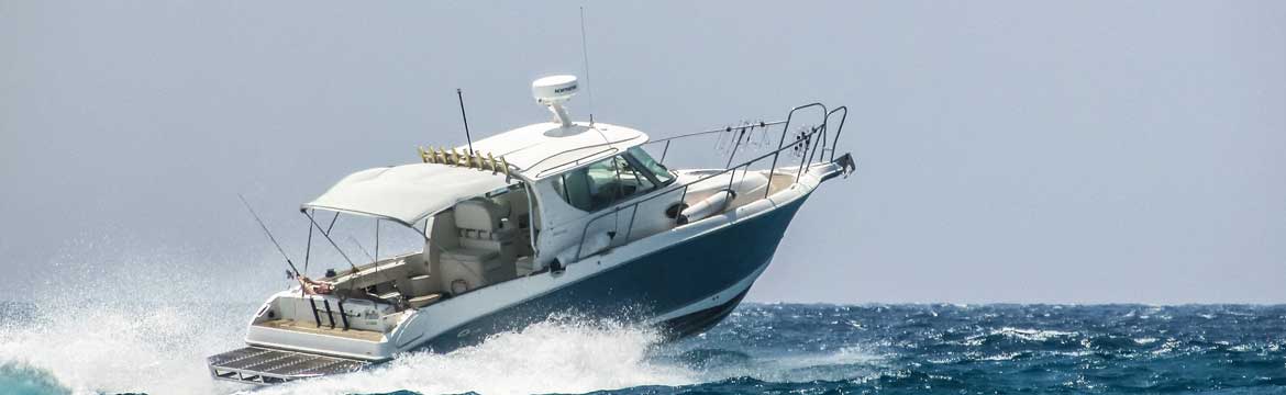 a boat powering through the waves